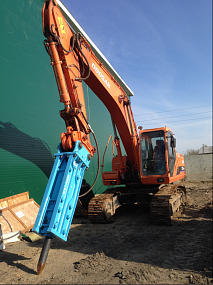 Эксаватор гусеничный с гидромолотом Doosan 225