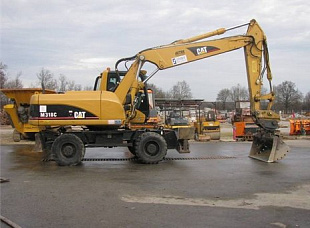 Экскаватор полноповоротный колесный CAT M318C